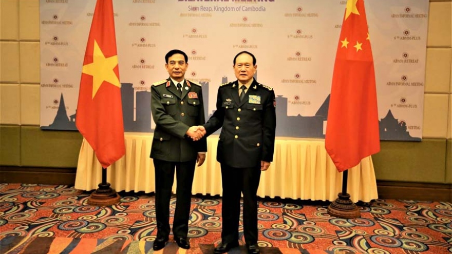 Vietnam, China agree to boost defense cooperation